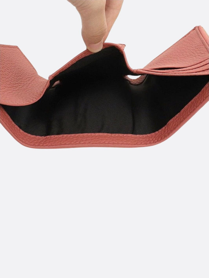 Cartera de piel de tres pliegues