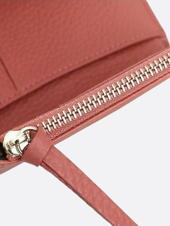 Cartera de piel de tres pliegues