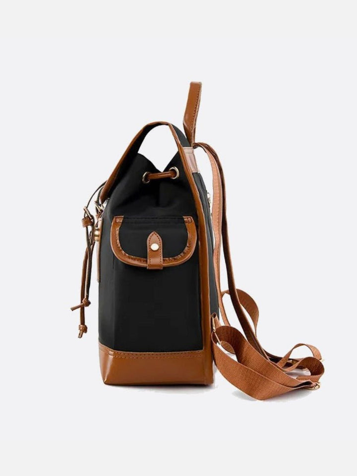 Mochila de lona y piel.