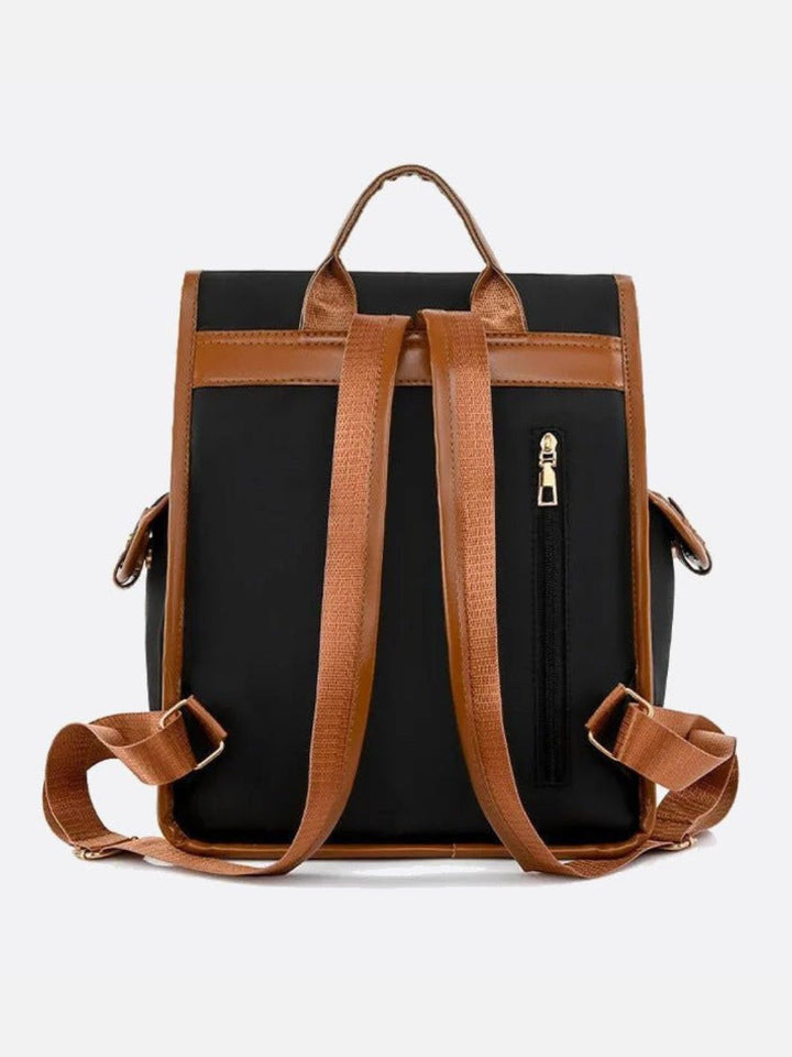 Mochila de lona y piel.