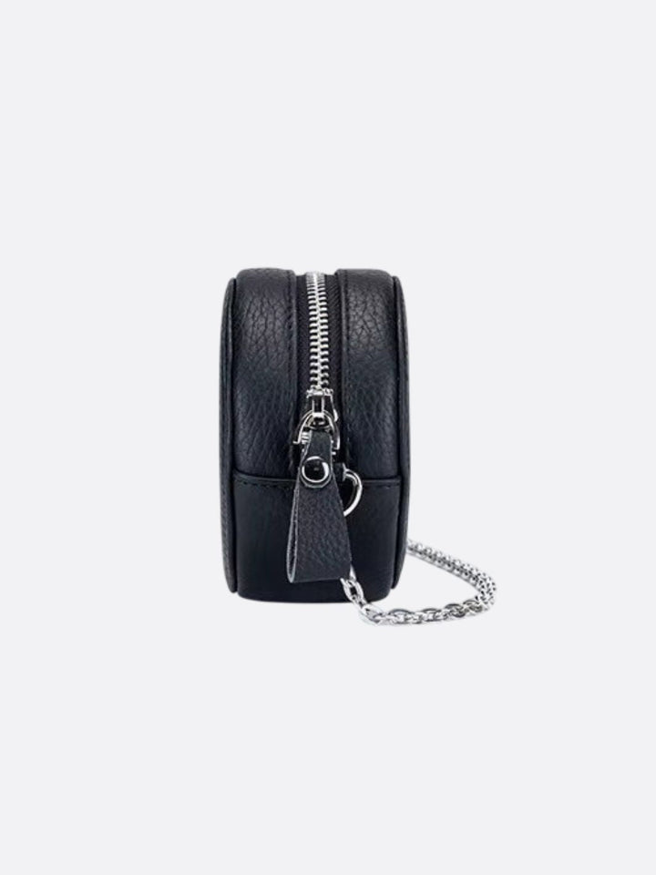 Bolso redondo de piel